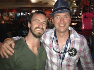 A couple of rock stars just hanging out at the bar. 